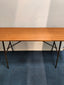 Knitting machine that can be folded and made from wooden top and metal legs
