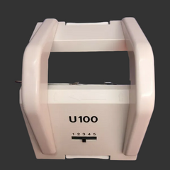 A Passap U100 knitting machine transfer carriage, predominantly white in color, against a blue background