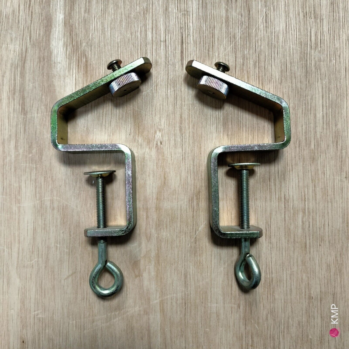 the image depicts Knitmaster  SRP-20 Ribber TABLE CLAMPS (X2). Main image