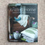 A hand knitting book called The Knitted Home: Hand-knitted projects room by room book by Sian Brown