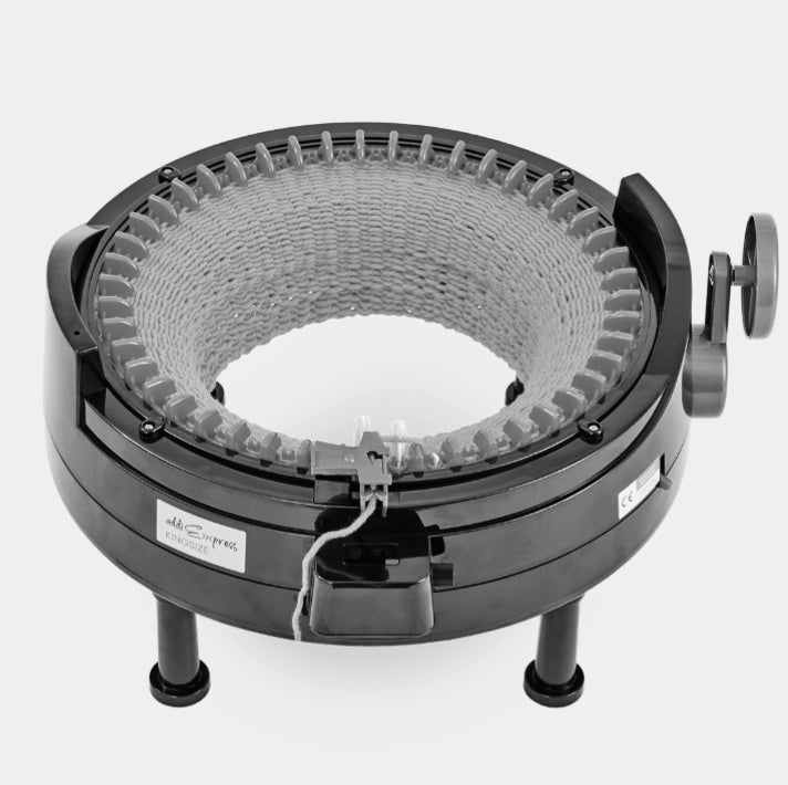 addiExpress circular knitting machine with a white background