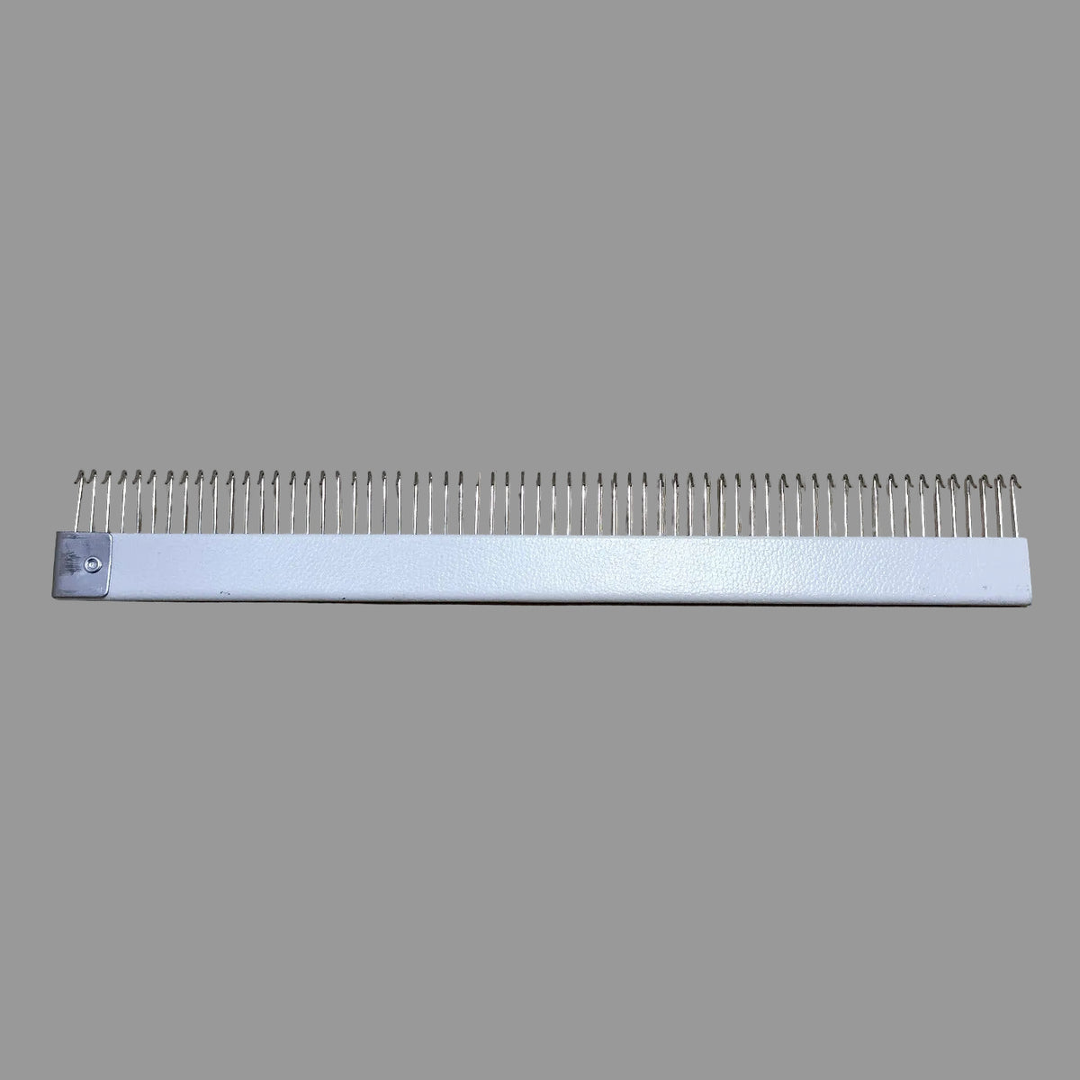 what you see is a Brother KH-965 Electroknit CAST ON COMB