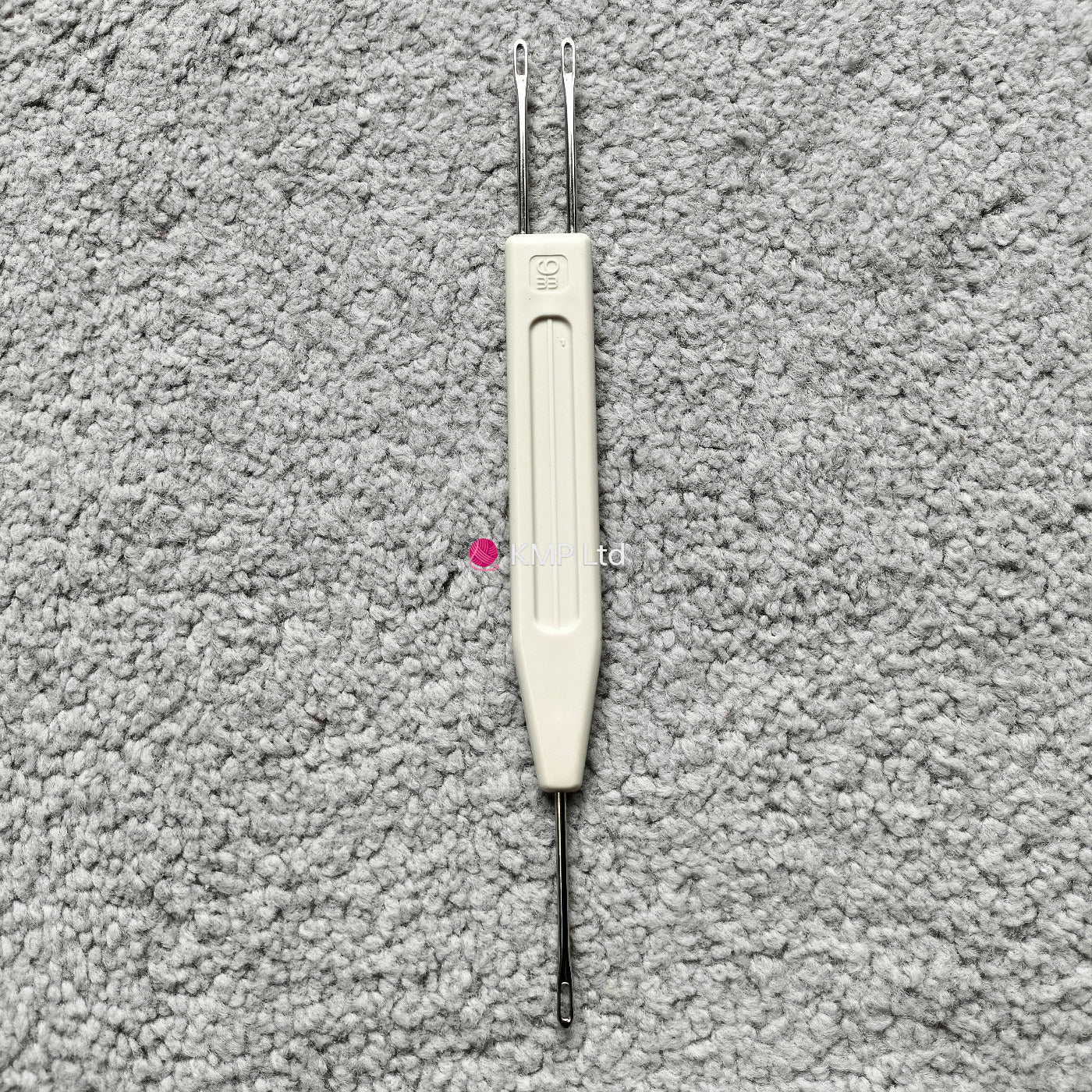 A Silver Reed chunky electronic knitting machine 1x2 stitch transfer tool, with a white handle and two metal tips Main image