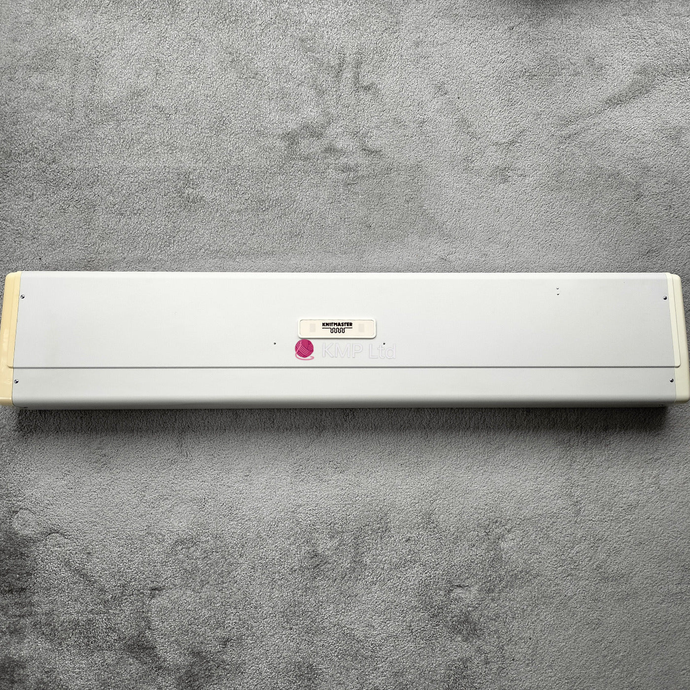 Silver Reed SK 890 Chunky Electronic Knitting Machine TOP COVER, used, with visible signs of wear like yellowing on the side edges. Main image